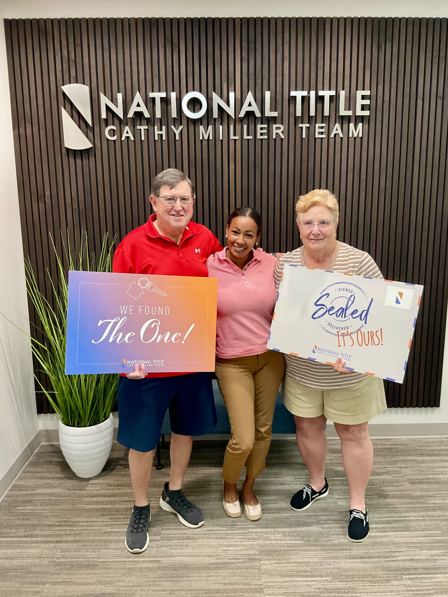 Clients celebrating at a North Texas title office closing